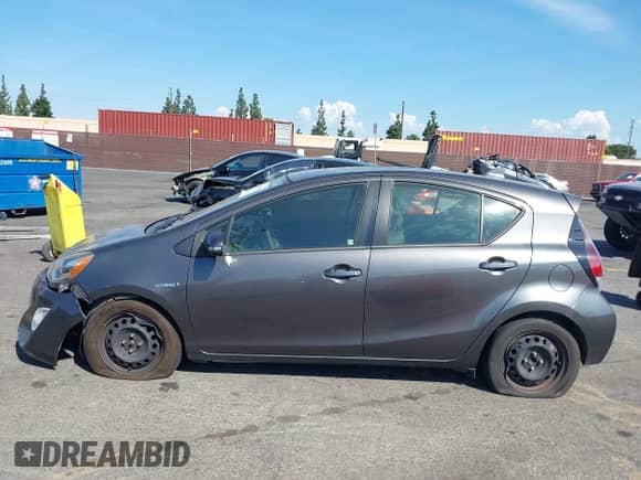 2015 Toyota Prius One z VIN JTDKDTB38F1111002, wystawiony jako IAAI lot #43250745 z przebiegiem 229 161 mil mil oraz . Historia ofert i sprzedaży dostępna na DreamBid. Obrazek 14.