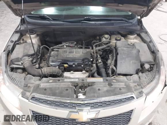 2011 Chevrolet Cruze 1FL z VIN 1G1PE5S96B7194772, wystawiony jako IAAI lot #42960661 z przebiegiem 125 970 mil mil oraz . Historia ofert i sprzedaży dostępna na DreamBid. Obrazek 10.