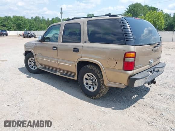 2000 Chevrolet Tahoe LS z VIN 1GNEK13T5YJ189365, wystawiony jako IAAI lot #42377964 z przebiegiem 193 875 mil mil oraz . Historia ofert i sprzedaży dostępna na DreamBid. Obrazek 3.