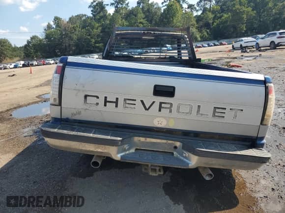 1997 Chevrolet Silverado 1500 z VIN 1GCEK14M4VZ166799, wystawiony jako Copart lot #69846415 z przebiegiem 195 832 mil mil oraz Szkoda całkowita • Salvage title. Historia ofert i sprzedaży dostępna na DreamBid. Obrazek 6.