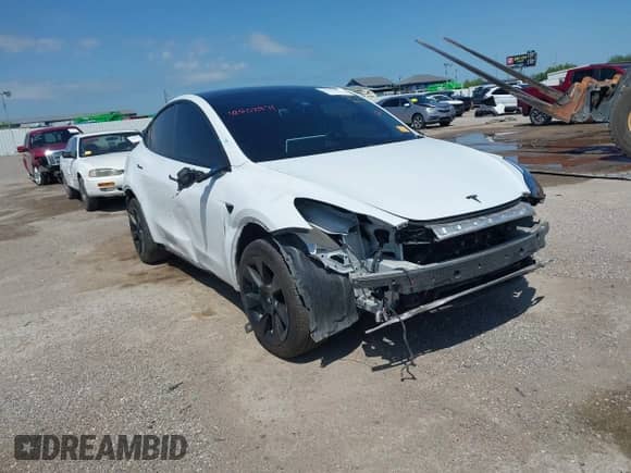 2023 Tesla Model Y Long Range z VIN 7SAYGDEE0PA178495, wystawiony jako IAAI lot #42507571 z przebiegiem 55 840 mil mil oraz . Historia ofert i sprzedaży dostępna na DreamBid. Obrazek 1.