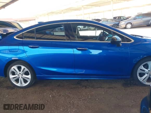 2016 Chevrolet Cruze Premier z VIN 1G1BG5SM0G7324934, wystawiony jako IAAI lot #42690646 z przebiegiem 111 716 mil mil oraz . Historia ofert i sprzedaży dostępna na DreamBid. Obrazek 13.