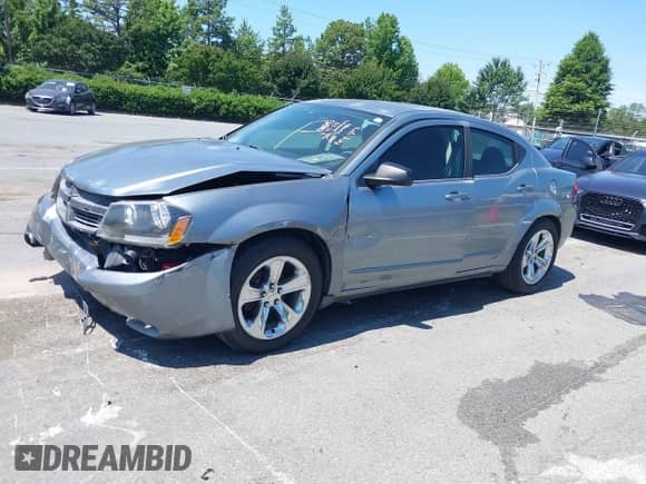 2009 Dodge Avenger SE with VIN 1B3LC46B59N569481, listed as a IAAI auction lot 42543825 with 182,158 mi miles and . Bid and sale history available at DreamBid. Image 2.