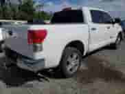 2010 Toyota Tundra Limited with VIN 5TFFY5F15AX093994, listed as a Copart auction lot 79749944 with Not provided miles and Salvage title. Bid and sale history available at DreamBid. Image 3.