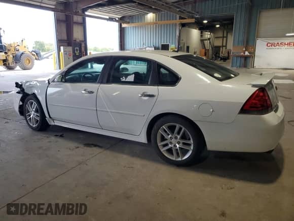 2012 Chevrolet Impala LTZ with VIN 2G1WC5E30C1221083, listed as a Copart auction lot 81643965 with 153,674 mi miles and Salvage title. Bid and sale history available at DreamBid. Image 2.