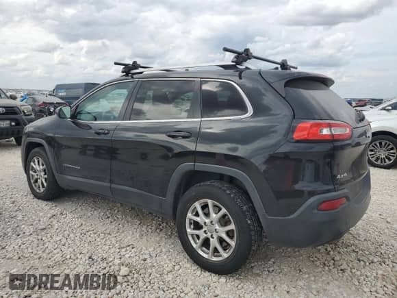 2014 Jeep Cherokee Latitude with VIN 1C4PJMCS7EW241090, listed as a Copart auction lot 82779675 with 146,040 mi miles and Clean title. Bid and sale history available at DreamBid. Image 2.