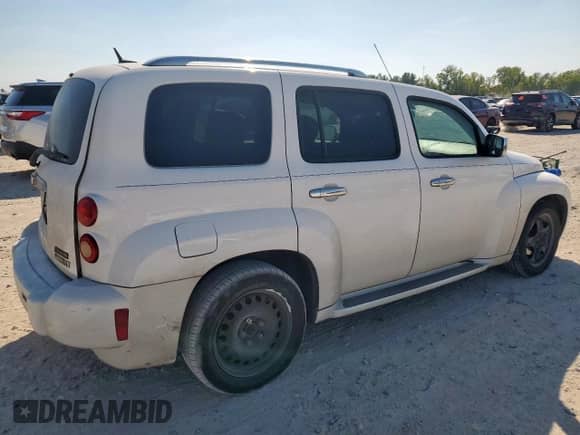 2010 Chevrolet HHR 1LT with VIN 3GNBABDB0AS565556, listed as a Copart auction lot 82480945 with 152,833 mi miles and Salvage title. Bid and sale history available at DreamBid. Image 3.
