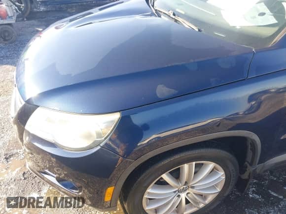 2011 Volkswagen Tiguan SE with VIN WVGAV7AX6BW526154, listed as a IAAI auction lot 41278373 with 162,851 mi miles and . Bid and sale history available at DreamBid. Image 17.