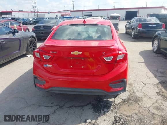 2018 Chevrolet Cruze LT with VIN 1G1BE5SM6J7205217, listed as a IAAI auction lot 43413199 with 95,771 mi miles and . Bid and sale history available at DreamBid. Image 16.