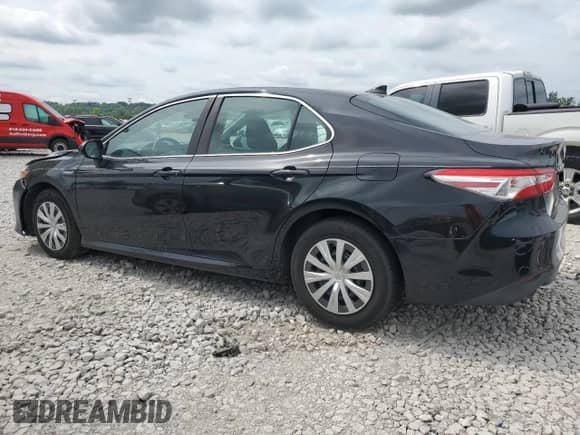2019 Toyota Camry Hybrid LE с VIN 4T1B31HK2KU510627, выставлен на аукционе Copart как лот 63571895 с пробегом 114 603 миль миль и Списание • Salvage title. История ставок и продаж доступна на DreamBid. Изображение 2.