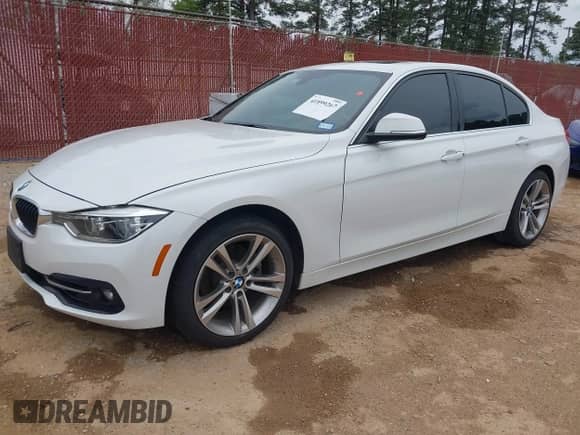 2018 BMW 3 Series 330i with VIN WBA8B9C59JEE82660, listed as a IAAI auction lot 41899267 with 65,205 mi miles and . Bid and sale history available at DreamBid. Image 18.