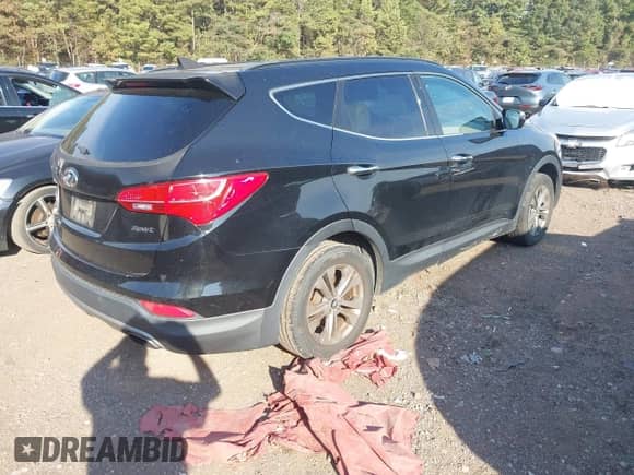 2014 Hyundai Santa Fe with VIN 5XYZU3LB5EG179194, listed as a IAAI auction lot 43249117 with 164,045 mi miles and . Bid and sale history available at DreamBid. Image 4.