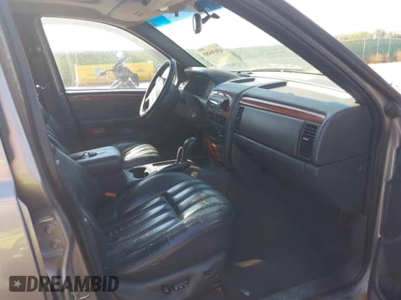 1999 Jeep Grand Cherokee Limited с VIN 1J4GW68N1XC743673, выставлен на аукционе IAAI как лот 43030485 с пробегом 201 108 миль миль и . История ставок и продаж доступна на DreamBid. Изображение 5.