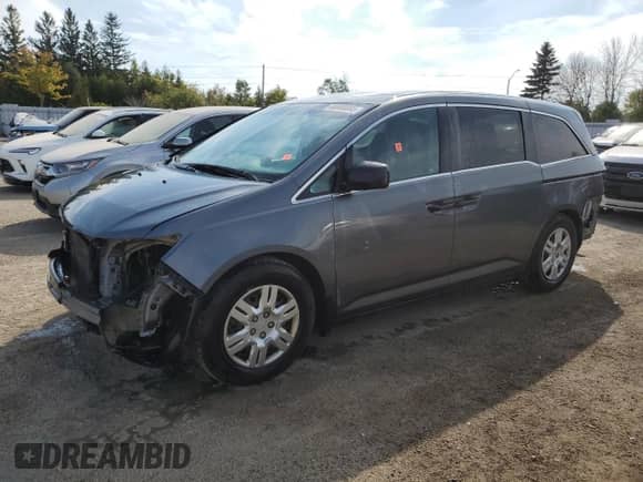 2012 Honda Odyssey LX z VIN 5FNRL5H27CB501748, wystawiony jako Copart lot #80800885 z przebiegiem 266 196 mil mil oraz Czysty tytuł • Clean title. Historia ofert i sprzedaży dostępna na DreamBid. Obrazek 1.