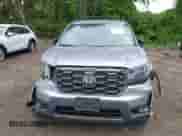 2023 Honda Passport TrailSport z VIN 5FNYF8H66PB024923, wystawiony jako IAAI lot #42243780 z przebiegiem 14 358 mil mil oraz . Historia ofert i sprzedaży dostępna na DreamBid. Obrazek 11.