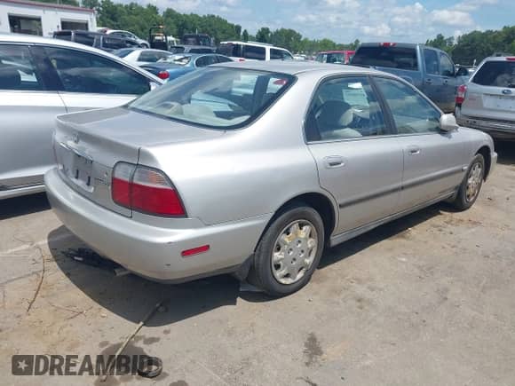 1996 Honda Accord LX with VIN 1HGCD5630TA172402, listed as a IAAI auction lot 42758297 with 209,914 mi miles and . Bid and sale history available at DreamBid. Image 4.