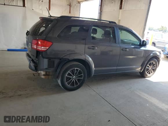 2018 Dodge Journey SE with VIN 3C4PDCAB8JT363798, listed as a Copart auction lot 69056075 with 112,138 mi miles and Salvage title. Bid and sale history available at DreamBid. Image 3.