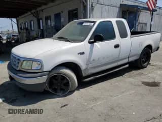 1999 Ford F-150 с VIN 1FTZX172XXKB19771, выставлен на аукционе Copart как лот 66101165 с пробегом Не указан миль и Списание • Salvage title. История ставок и продаж доступна на DreamBid. Изображение 1.