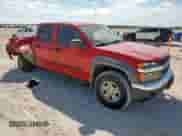 2007 Chevrolet Colorado 2LT with VIN 1GCDS13E478247381, listed as a Copart auction lot 65957215 with 142,421 mi miles and Salvage title. Bid and sale history available at DreamBid. Image 4.