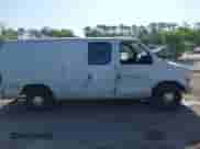 1999 Ford Econoline Cargo with VIN 1FTRE1420XHA34056, listed as a IAAI auction lot 41998411 with 236,267 mi miles and . Bid and sale history available at DreamBid. Image 13.