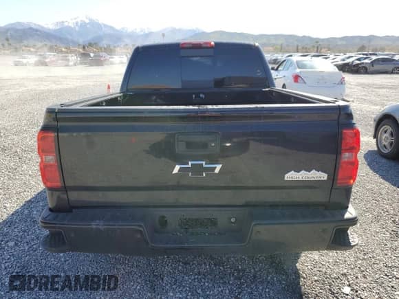 2014 Chevrolet Silverado 1500 High Country z VIN 3GCPCTEC5EG391434, wystawiony jako Copart lot #49719065 z przebiegiem Nie podano mil oraz Szkoda całkowita • Salvage title. Historia ofert i sprzedaży dostępna na DreamBid. Obrazek 6.