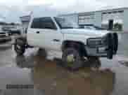 2000 Dodge 2500 with VIN 3B7KF2363YG114309, listed as a Copart auction lot 60270975 with 214,660 mi miles and Salvage title. Bid and sale history available at DreamBid. Image 4.