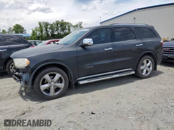 2013 Dodge Durango Citadel with VIN 1C4RDHEG8DC571935, listed as a Copart auction lot 60273705 with 169,219 mi miles and Salvage title. Bid and sale history available at DreamBid. Image 1.