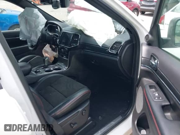 2021 Jeep Grand Cherokee Trailhawk z VIN 1C4RJFLG7MC588578, wystawiony jako IAAI lot #42748836 z przebiegiem 96 261 mil mil oraz . Historia ofert i sprzedaży dostępna na DreamBid. Obrazek 5.