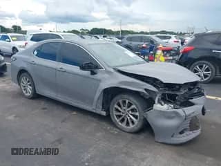 2021 Toyota Camry LE with VIN 4T1C11AK7MU480046, listed as a IAAI auction lot 43289437 with 70,687 mi miles and . Bid and sale history available at DreamBid. Image 1.