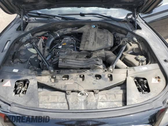 2015 BMW 7 Series 740i z VIN WBAYA6C53FGK16514, wystawiony jako Copart lot #62122595 z przebiegiem 151 258 mil mil oraz Szkoda całkowita • Salvage title. Historia ofert i sprzedaży dostępna na DreamBid. Obrazek 11.