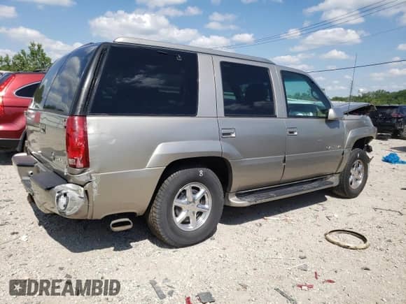 2000 Cadillac Escalade z VIN 1GYEK13R7YR128401, wystawiony jako Copart lot #46227845 z przebiegiem 110 194 mil mil oraz Nie do naprawy • Non repairable. Historia ofert i sprzedaży dostępna na DreamBid. Obrazek 3.