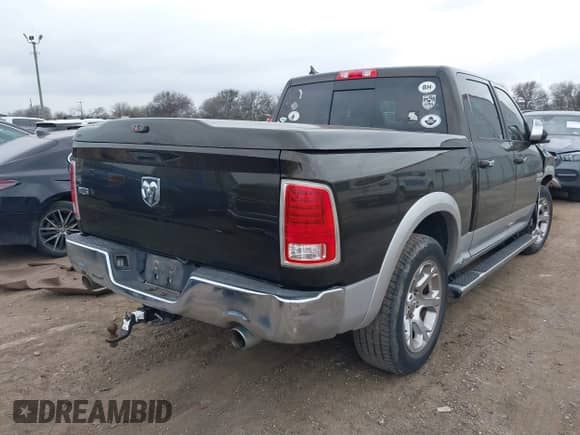 2013 Ram 1500 Laramie with VIN 1C6RR6NT5DS697668, listed as a IAAI auction lot 41501112 with 146,001 mi miles and . Bid and sale history available at DreamBid. Image 4.