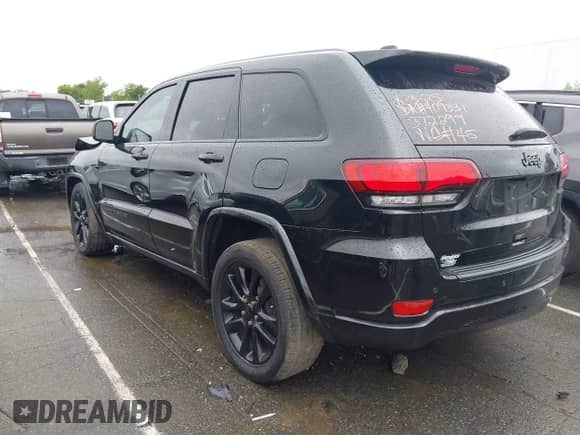2020 Jeep Grand Cherokee Laredo E with VIN 1C4RJEAG3LC372299, listed as a IAAI auction lot 42915775 with 92,823 mi miles and . Bid and sale history available at DreamBid. Image 3.