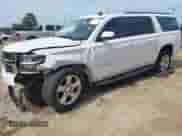 2015 Chevrolet Suburban LT z VIN 1GNSCJKC4FR298108, wystawiony jako IAAI lot #42649373 z przebiegiem 150 155 mil mil oraz . Historia ofert i sprzedaży dostępna na DreamBid. Obrazek 2.