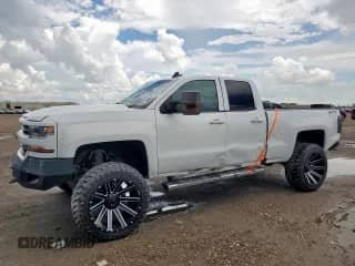 2017 Chevrolet Silverado 1500 LT with VIN 1GCVKREC5HZ235895, listed as a Copart auction lot 69241775 with 172,483 mi miles and Salvage title. Bid and sale history available at DreamBid. Image 1.