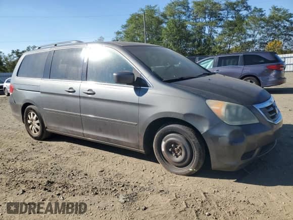 2008 Honda Odyssey EX z VIN 5FNRL38418B067095, wystawiony jako Copart lot #85342245 z przebiegiem 214 324 mil mil oraz Czysty tytuł • Clean title. Historia ofert i sprzedaży dostępna na DreamBid. Obrazek 4.