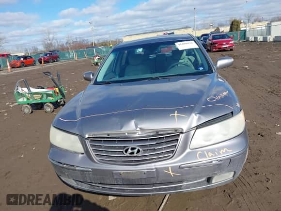 2008 Hyundai Azera Limited z VIN KMHFC46F18A303830, wystawiony jako IAAI lot #41488930 z przebiegiem 245 844 mil mil oraz . Historia ofert i sprzedaży dostępna na DreamBid. Obrazek 6.