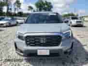 2024 Honda Passport EX-L with VIN 5FNYF8H5XRB018374, listed as a Copart auction lot 60676545 with 30,898 mi miles and Salvage title. Bid and sale history available at DreamBid. Image 5.