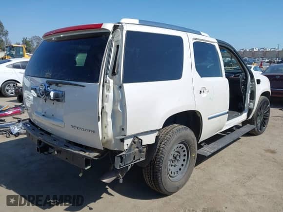 2011 Cadillac Escalade Premium with VIN 1GYS4CEF0BR162201, listed as a IAAI auction lot 42121589 with 160,290 mi miles and . Bid and sale history available at DreamBid. Image 4.