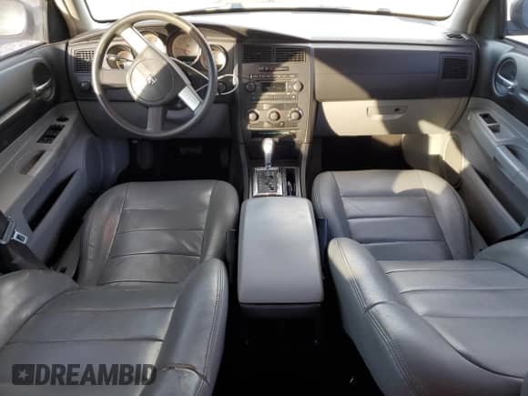 2007 Dodge Magnum с VIN 2D4FV47T27H695612, выставлен на аукционе Copart как лот 87286584 с пробегом 118 879 миль миль и Списание • Salvage title. История ставок и продаж доступна на DreamBid. Изображение 8.