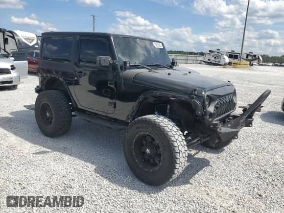2013 Jeep Wrangler Sport with VIN 1C4AJWAG1DL546293, listed as a Copart auction lot 70635665 with 99,229 mi miles and Salvage title. Bid and sale history available at DreamBid. Image 4.
