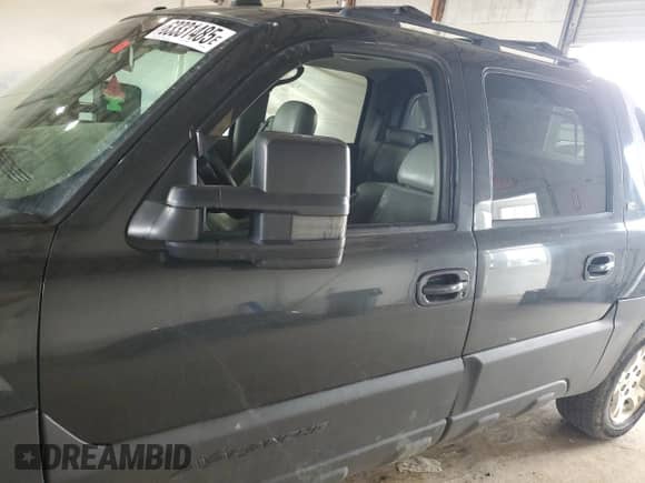 2005 Chevrolet Avalanche LS z VIN 3GNEK12Z55G296676, wystawiony jako Copart lot #63331485 z przebiegiem 187 311 mil mil oraz Szkoda całkowita • Salvage title. Historia ofert i sprzedaży dostępna na DreamBid. Obrazek 7.