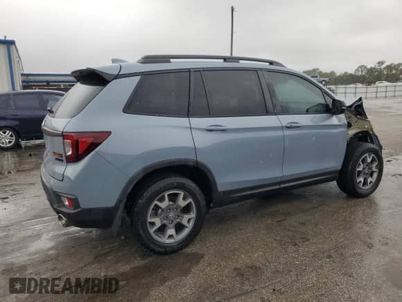 2023 Honda Passport TrailSport с VIN 5FNYF8H64PB003178, выставлен на аукционе Copart как лот 86158365 с пробегом 21 415 миль миль и Списание • Salvage title. История ставок и продаж доступна на DreamBid. Изображение 3.