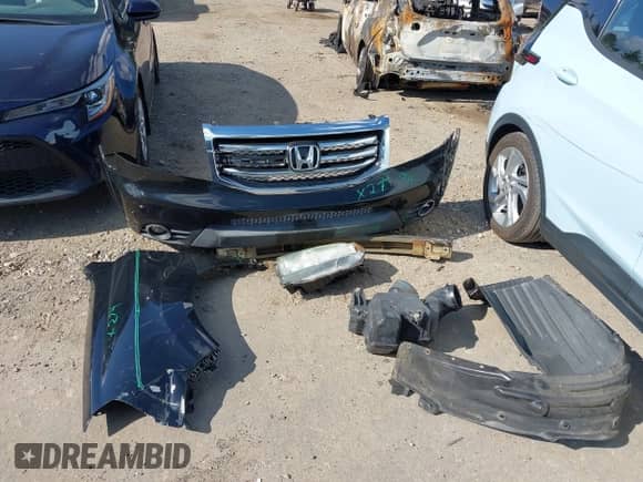 2015 Honda Pilot Touring z VIN 5FNYF4H91FB008470, wystawiony jako IAAI lot #43139852 z przebiegiem Nie podano mil oraz . Historia ofert i sprzedaży dostępna na DreamBid. Obrazek 12.