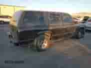 2000 Chevrolet Tahoe Limited with VIN 1GNEC13R5YR162329, listed as a Copart auction lot 84117434 with 177,241 mi miles and Salvage title. Bid and sale history available at DreamBid. Image 3.