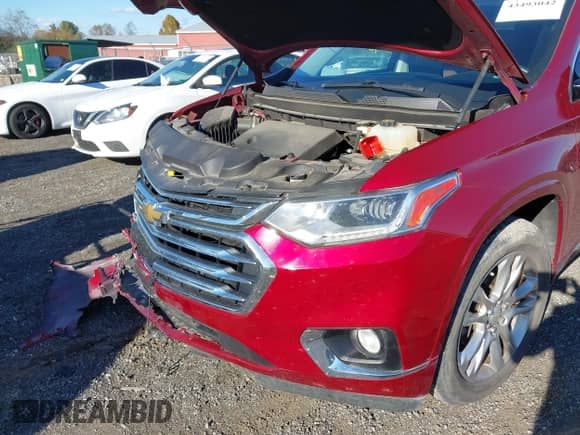 2018 Chevrolet Traverse High Country z VIN 1GNEVKKW1JJ119649, wystawiony jako IAAI lot #43493042 z przebiegiem 92 101 mil mil oraz . Historia ofert i sprzedaży dostępna na DreamBid. Obrazek 18.