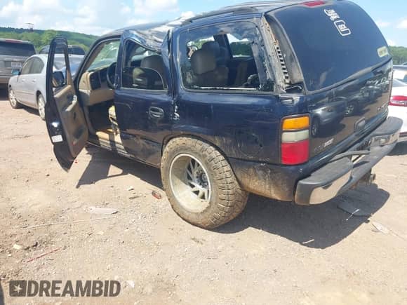 2004 Chevrolet Tahoe LT with VIN 1GNEC13Z94J281980, listed as a IAAI auction lot 42812157 with Not provided miles and . Bid and sale history available at DreamBid. Image 3.