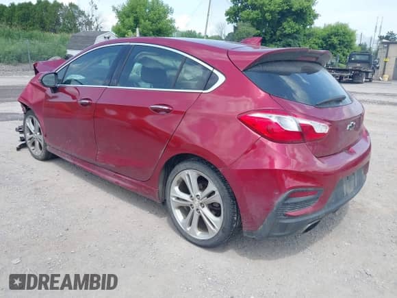 2017 Chevrolet Cruze Premier z VIN 3G1BF6SM1HS547186, wystawiony jako IAAI lot #42536555 z przebiegiem 110 805 mil mil oraz . Historia ofert i sprzedaży dostępna na DreamBid. Obrazek 3.