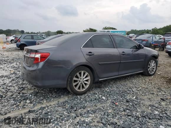 2014 Toyota Camry SE with VIN 4T1BK1FK5EU027210, listed as a Copart auction lot 67468025 with 133,438 mi miles and Salvage title. Bid and sale history available at DreamBid. Image 3.