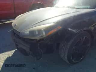 2008 Hyundai Tiburon GT z VIN KMHHN66F88U271875, wystawiony jako IAAI lot #43350299 z przebiegiem 165 115 mil mil oraz . Historia ofert i sprzedaży dostępna na DreamBid. Obrazek 6.